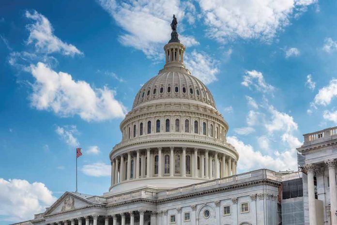 U.S. Capitol building dome under a blue sky.