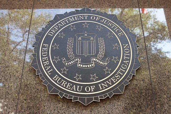 FBI seal on marble wall in daylight.