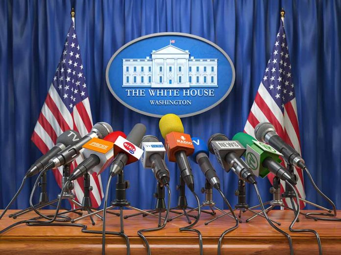 Multiple microphones at White House press briefing podium.