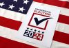 Presidential election 2024 sign on American flag.