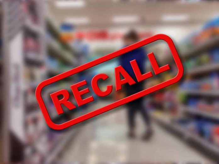 "Recall" stamp on blurred store aisle background.