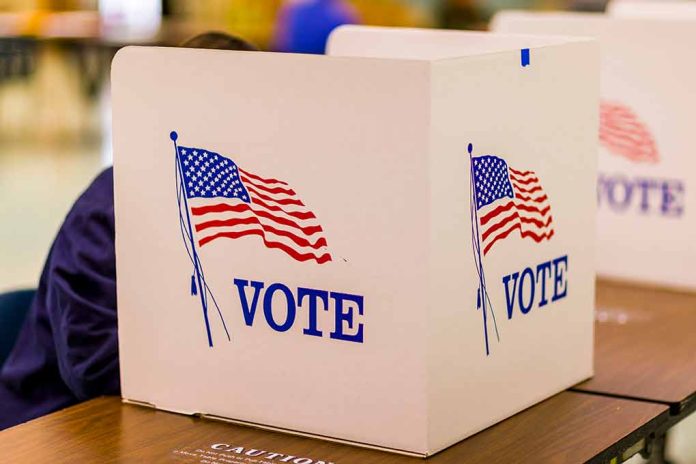 Voting booth with American flag and "VOTE" text.