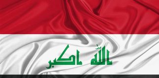 Iraq flag with Arabic script on white stripe