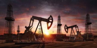 Oil pumps operating at sunset in a desert