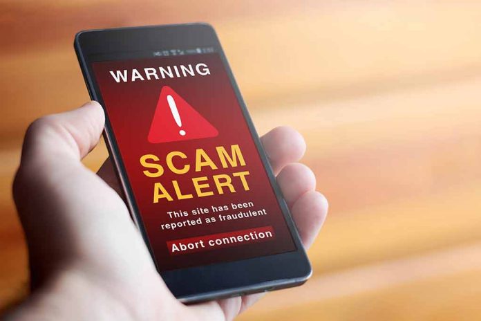 Phone showing scam alert warning message.