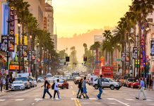 Busy street in Los Angeles at sunset.