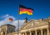 German flags at the Reichstag building in Berlin.