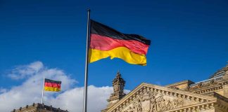 German flags at the Reichstag building in Berlin.