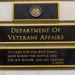 Department of Veterans Affairs building sign with quote.