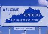 Welcome to Kentucky state sign with blue sky