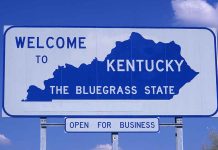 Welcome to Kentucky state sign with blue sky