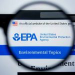 EPA logo under magnifying glass on computer screen