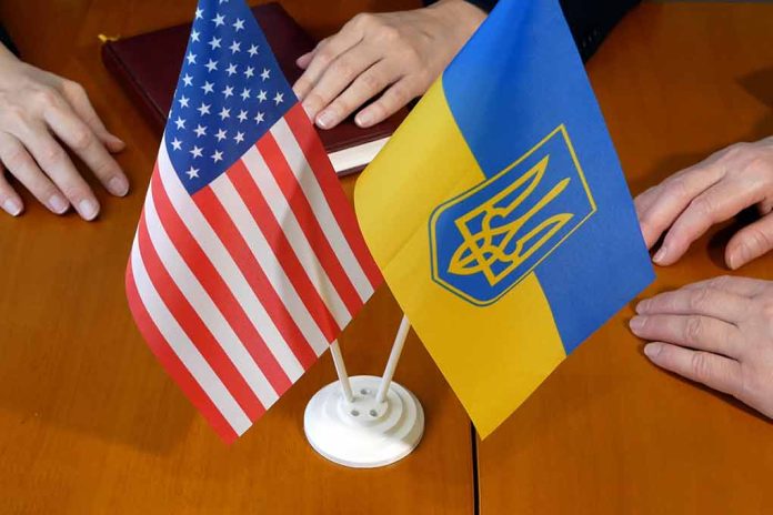 Flags of USA and Ukraine on table