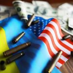 Flags, bullets, and dollar bills on a table.