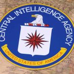 CIA seal on a vintage world map