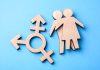 Transgender symbol and figures on blue background