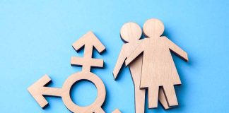 Transgender symbol and figures on blue background
