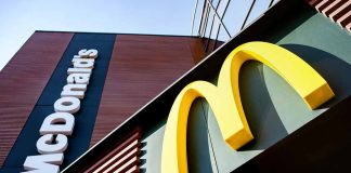 McDonald's logo and signage on building exterior.