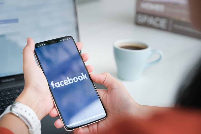1673871280 featured image Person holding phone with Facebook app open