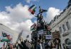 Protestors waving Palestinian flags