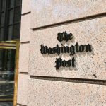 The Washington Post building entrance and logo