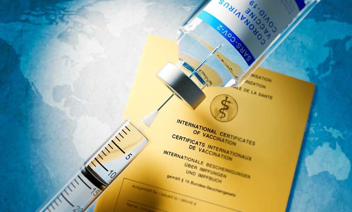 1821656393 featured image Vaccine in front of Covid-19 Vaccine Card