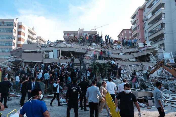 1845063010 featured image People at a collapsed building after an earthquake