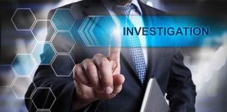 Man in suit pointing at Investigation text