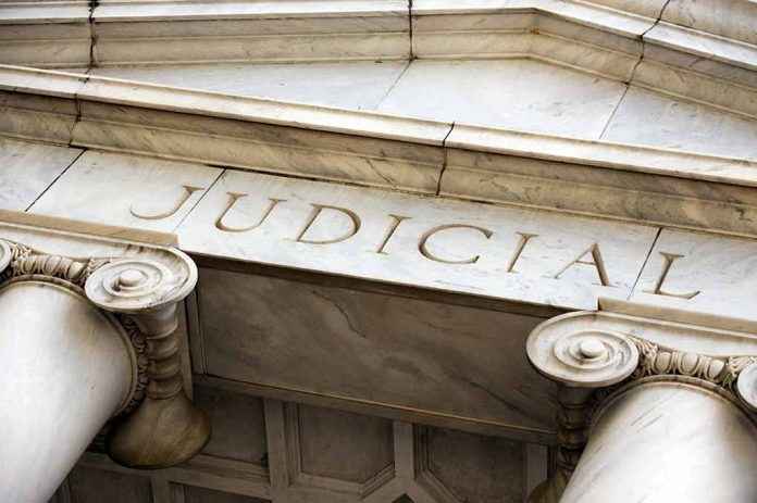 579394483 featured image Marble columns with the word Judicial engraved above