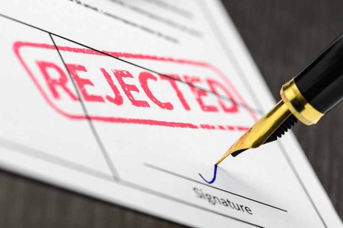 645114751 featured image Rejected stamp on a document with pen