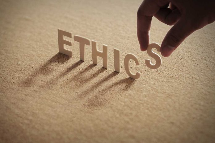 759448675 featured image Hand placing the letter S in the word ETHICS
