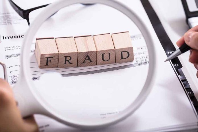 792864664 featured image Fraud blocks under magnifying glass on invoices