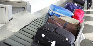 Suitcases on an airport baggage carousel
