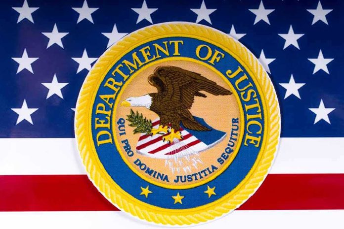 1054857686 featured image Department of Justice seal on American flag background
