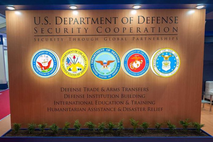 US Department of Defense Security Cooperation display with logos