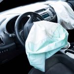Deployed airbags in car interior