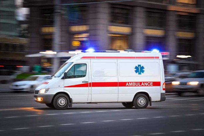 2002660841 featured image Ambulance driving on urban street with lights flashing