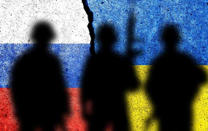 2095910923 featured image Silhouetted soldiers with Russian and Ukrainian flag backgrounds