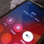 Phone screen showing 911 emergency call in progress