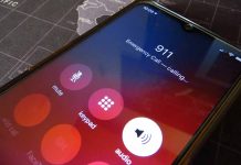 Phone screen showing 911 emergency call in progress