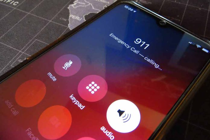 2326378557 featured image Phone screen showing 911 emergency call in progress