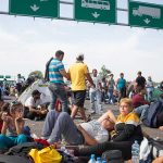 People sitting and resting on a highway