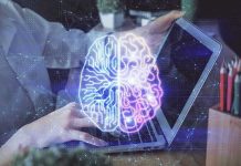 Futuristic AI brain hologram above a laptop computer