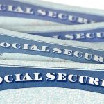 Several Social Security cards stacked together