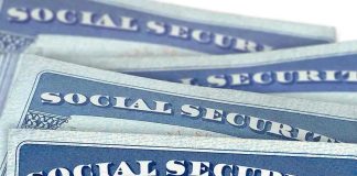 Several Social Security cards stacked together