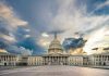US Capitol building with dramatic cloudy sky