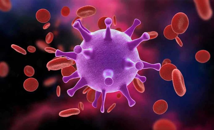 766978168 Virus surrounded by red blood cells