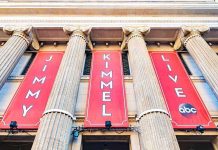 Exterior view of the Jimmy Kimmel Live studio with large red banners