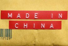 Red label reading MADE IN CHINA on brown packaging