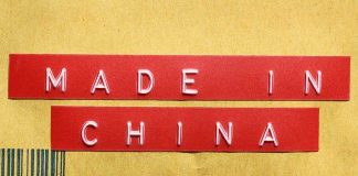 Red label reading MADE IN CHINA on brown packaging